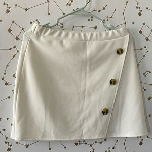 White/cream mini skirt w/ buttons